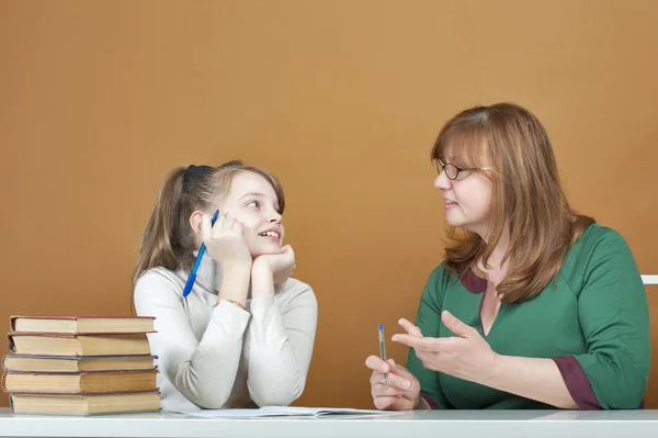 Woman teaches a ten-year girl