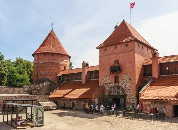 Tourists and Trakai Castle. Lithuania