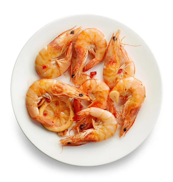 Roasted prawns on white plate