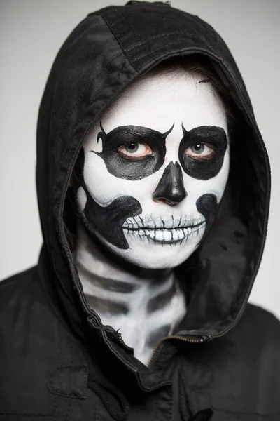 Woman painted like a skeleton