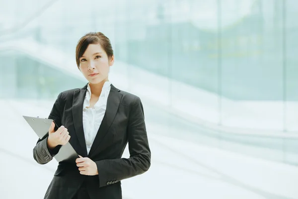 Asian businesswoman with folder with papers