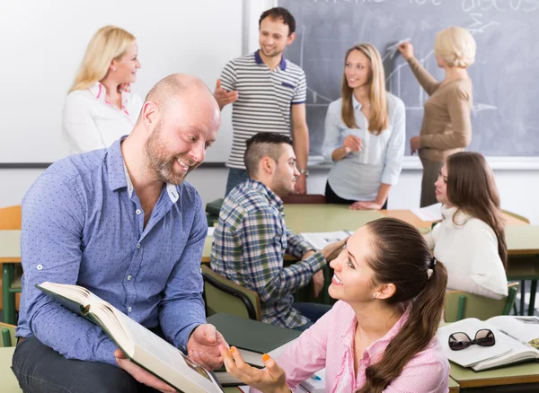 Students chatting at training session