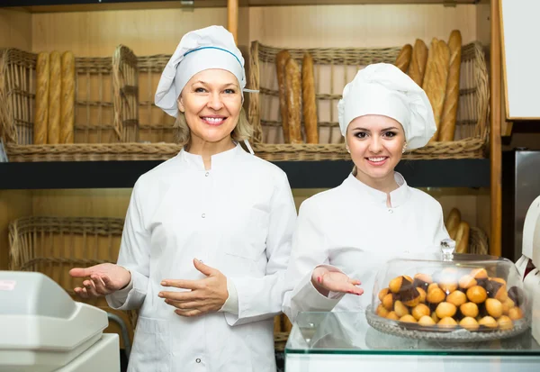 Two female bakers in baker