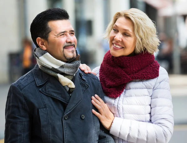 Couple walking in city