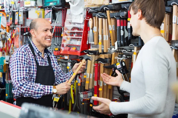 Ordinary smiling customer and seller