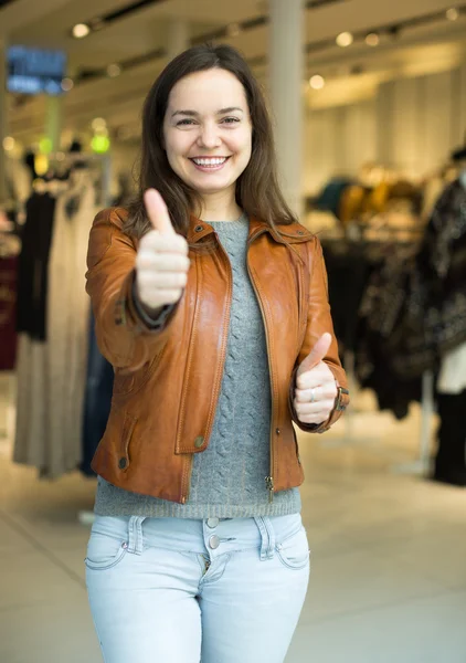 Portrait of happy woman in store