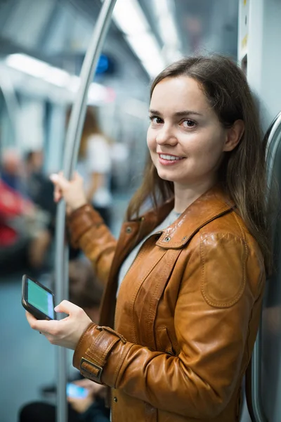 Woman reading from mobile phone screen