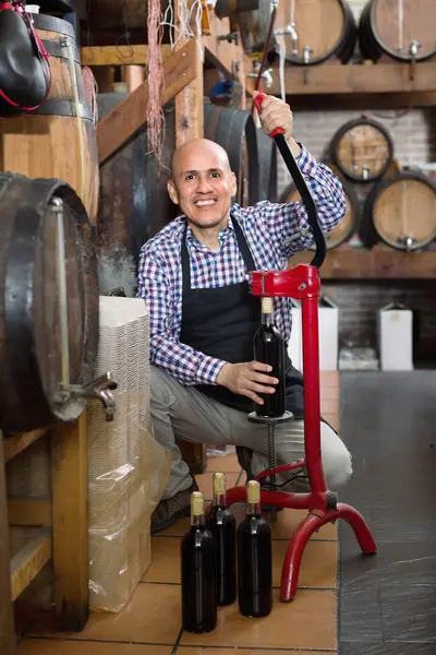 Mature male wine maker