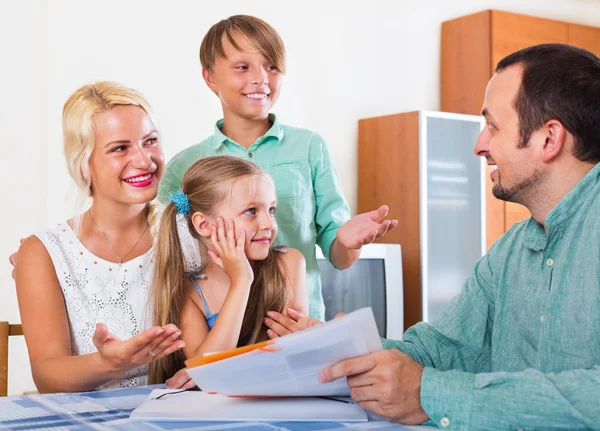 Bank agent consulting family with kids