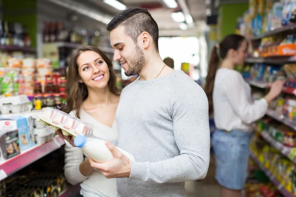 Young couple at grocery