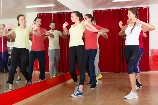 People street dancing in studio