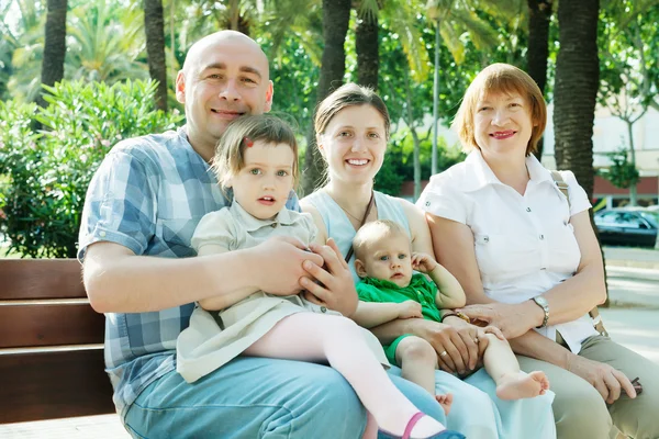 Joyful family of five  in summer