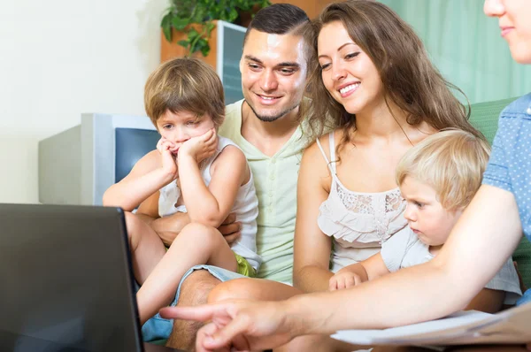 Four people listening to offers insurance agent