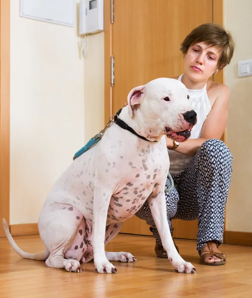 Woman with white big dog