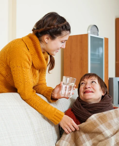 Daughter caring for unwell mother