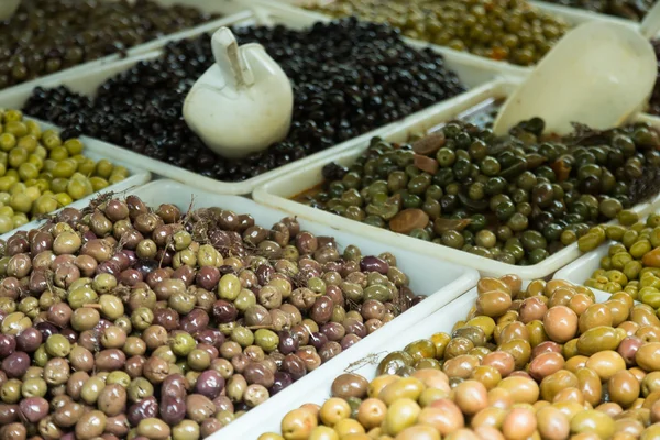 Market counter with pickled olives