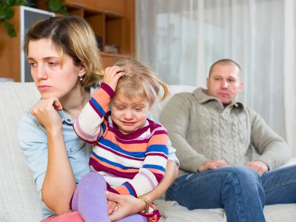 Couple with children having conflict