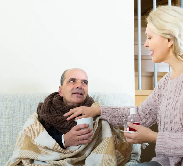 Woman taking care of senior patient