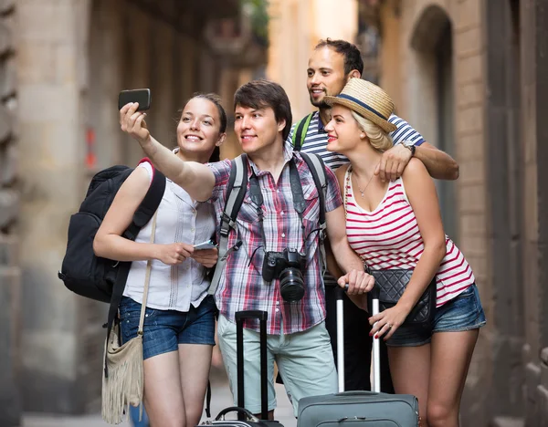 Young travelers doing selfie