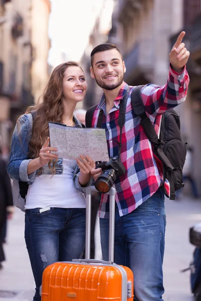 Positive man points the direction