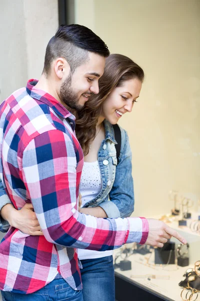 Couple choosing watch for present