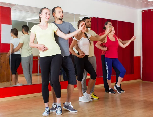 Group of people dancing salsa