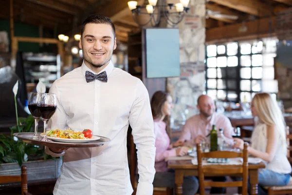 Portrait young male waiter