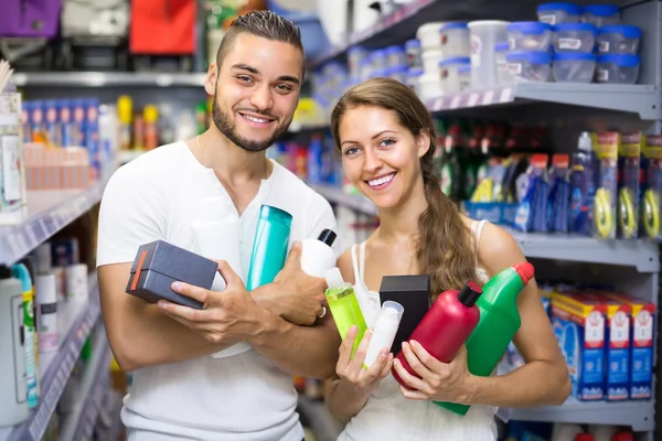 Couple with detergents, shampoo and perfume
