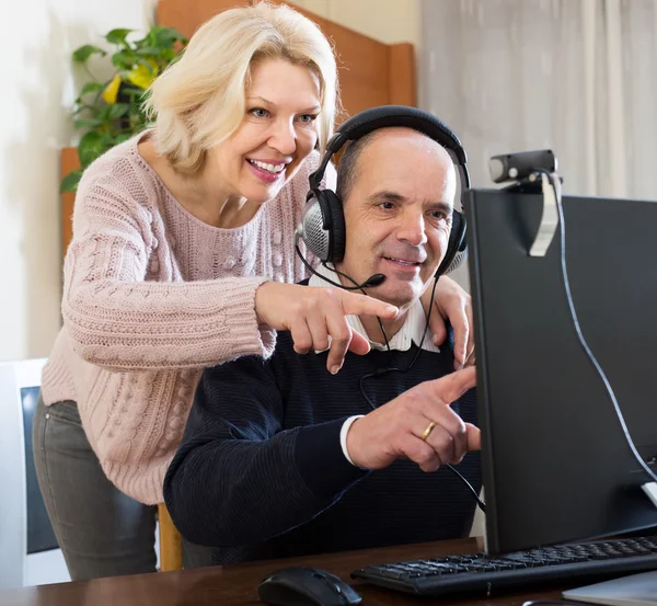 Spouses using PC for video calls