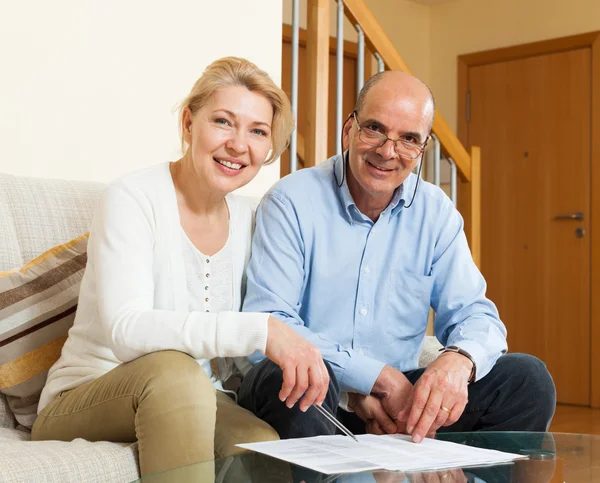 Couple with financial documents