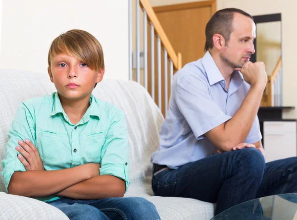 Unhappy son and dad