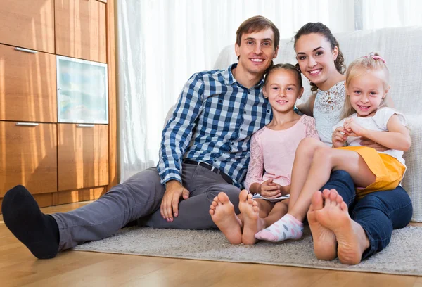 Relaxed family in domestic interior