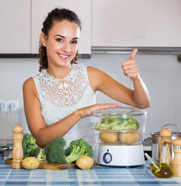 Housewife on diet cooking vegetables