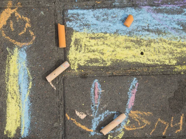 Children\'s drawings on the sidewalk.