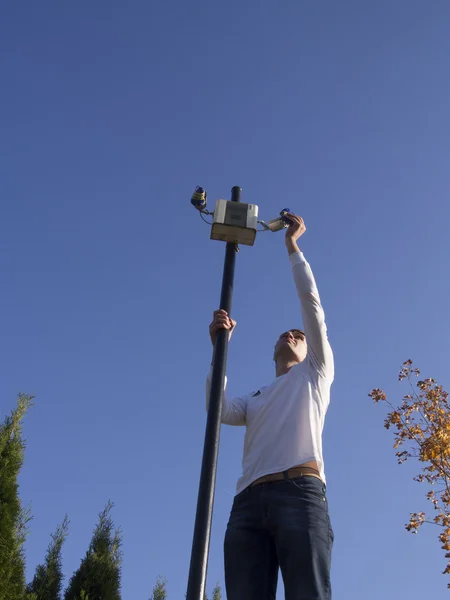 Activist glues lenses of cameras