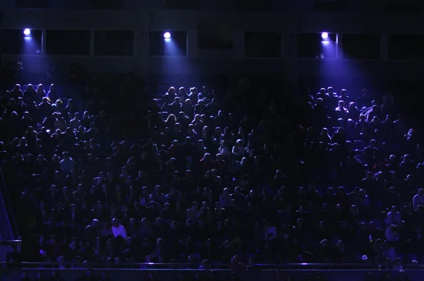 People watch the boxing fight