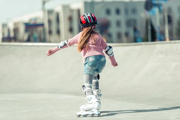 Little  girl on roller skates