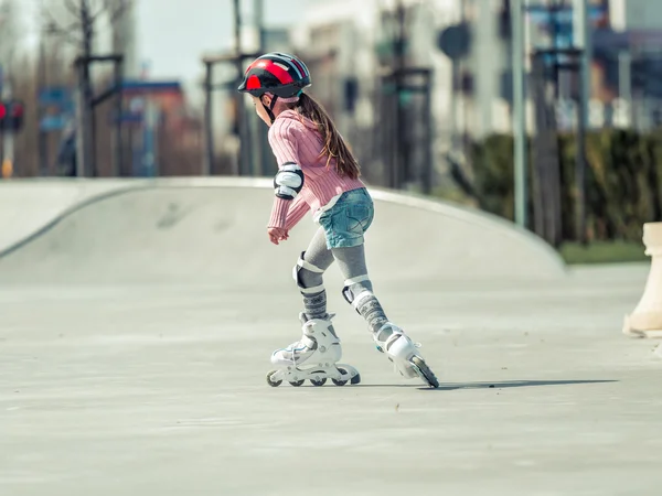 Little  girl on roller skates