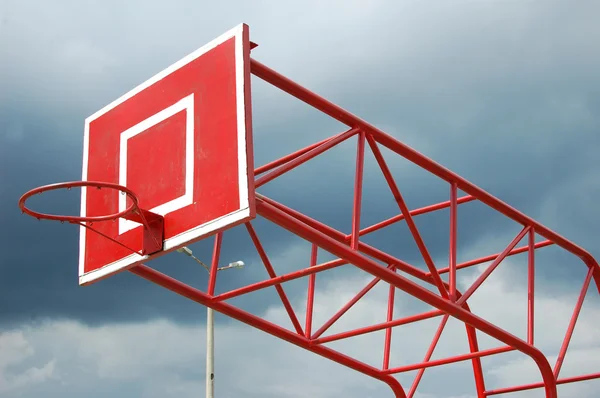 The Basketball court on cloudy background, basketball red shield in the background of fat heaven