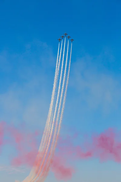 Aircraft performance with colorful smoke