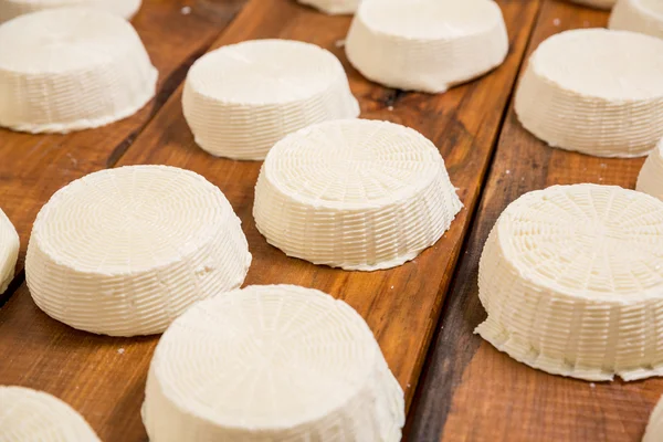 Salty soft goat cheese heads