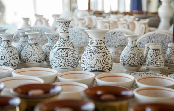 Bunch of different pattern clay  jars