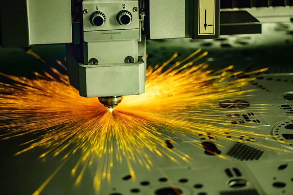 CNC Laser cutting of metal, modern industrial technology.