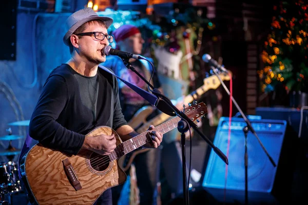 Band performs on stage