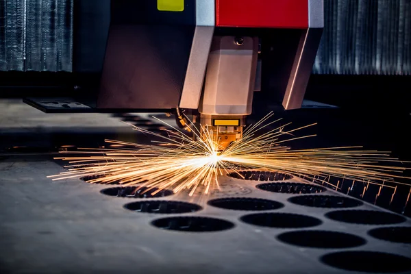 CNC Laser cutting of metal, modern industrial technology.