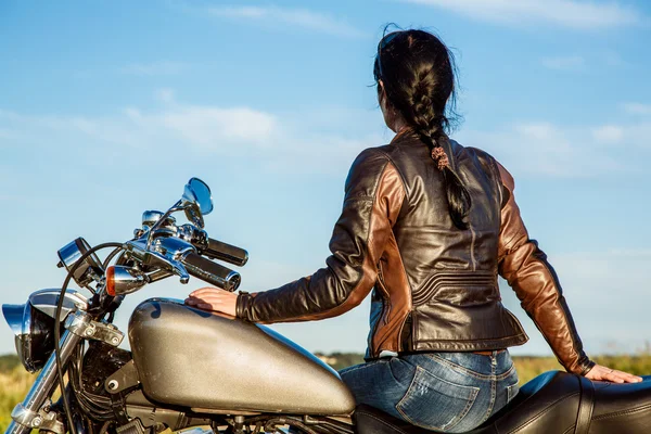 Biker girl on a motorcycle