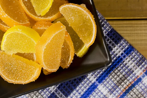 Candy jujube as lemon and orange slices