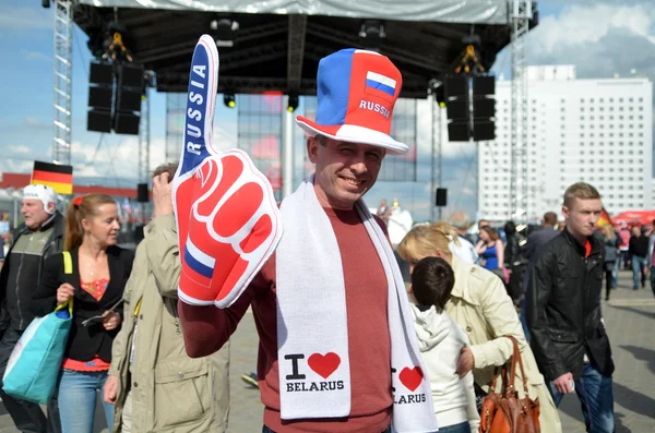 MINSK, BELARUS - MAY, 2014: people support their hockey teams at the 2014 IIHF World Championship