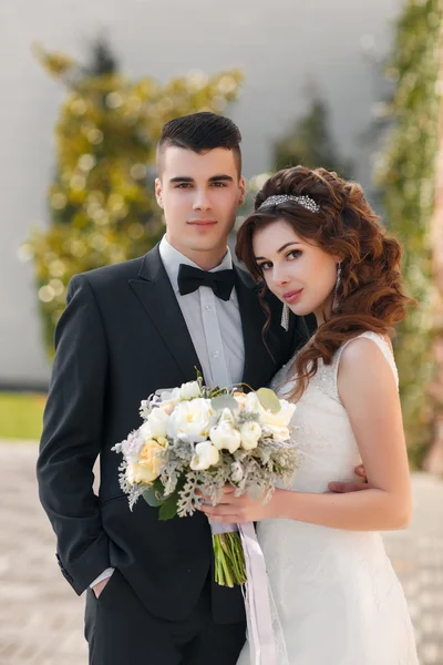 Beautiful young couple, the bride and groom