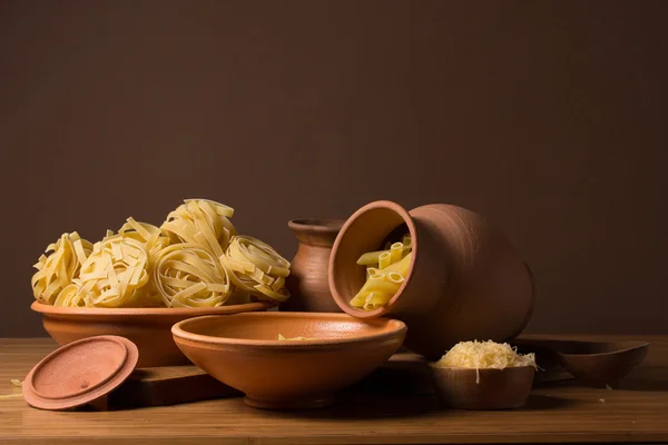 Still life with pasta and ceramic ware